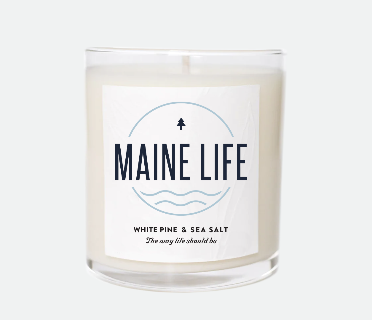Candle with Maine Life logo on front