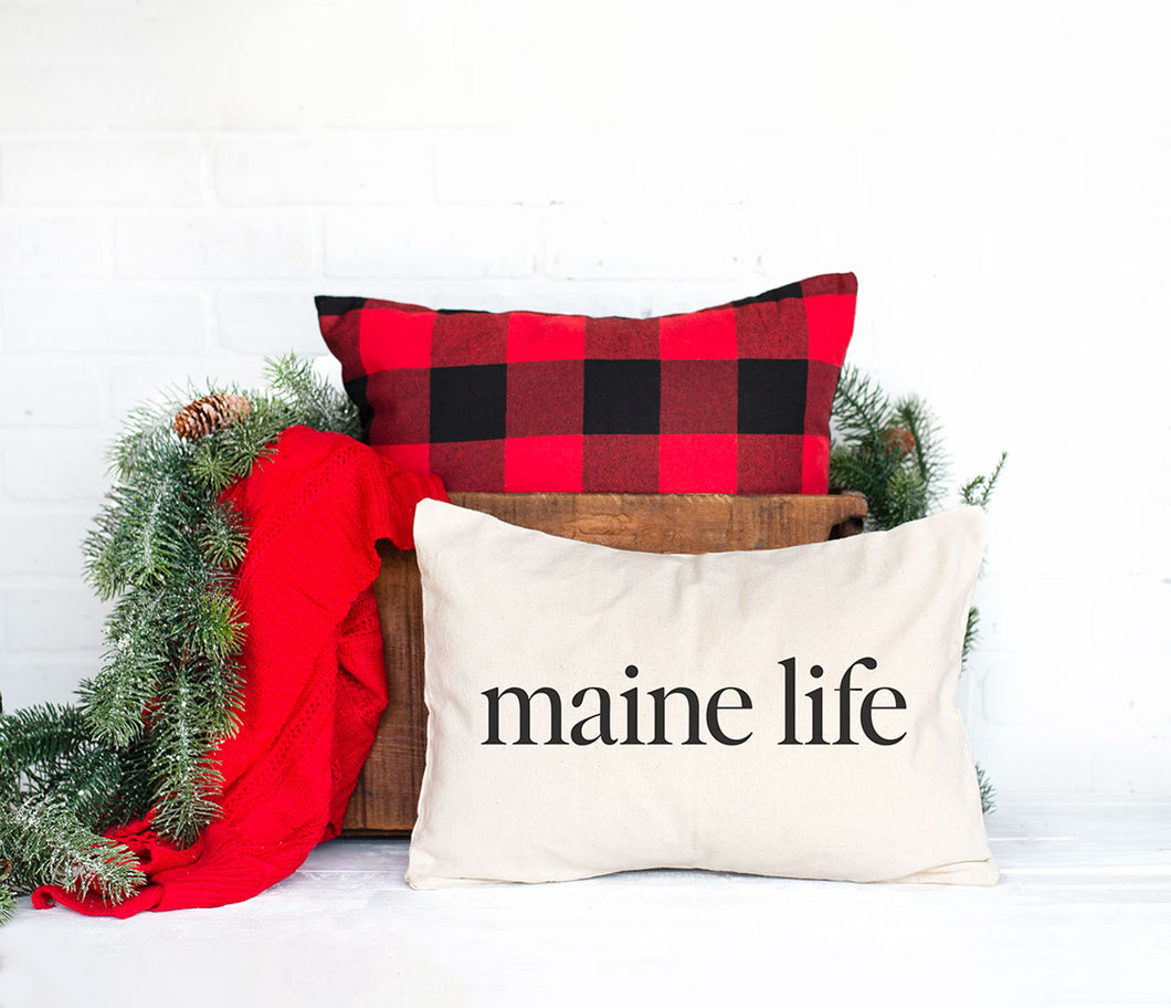 Small pillow that reads 'Maine Life'